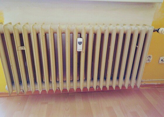Výměna starých litinových radiátorů v bytě v Praze